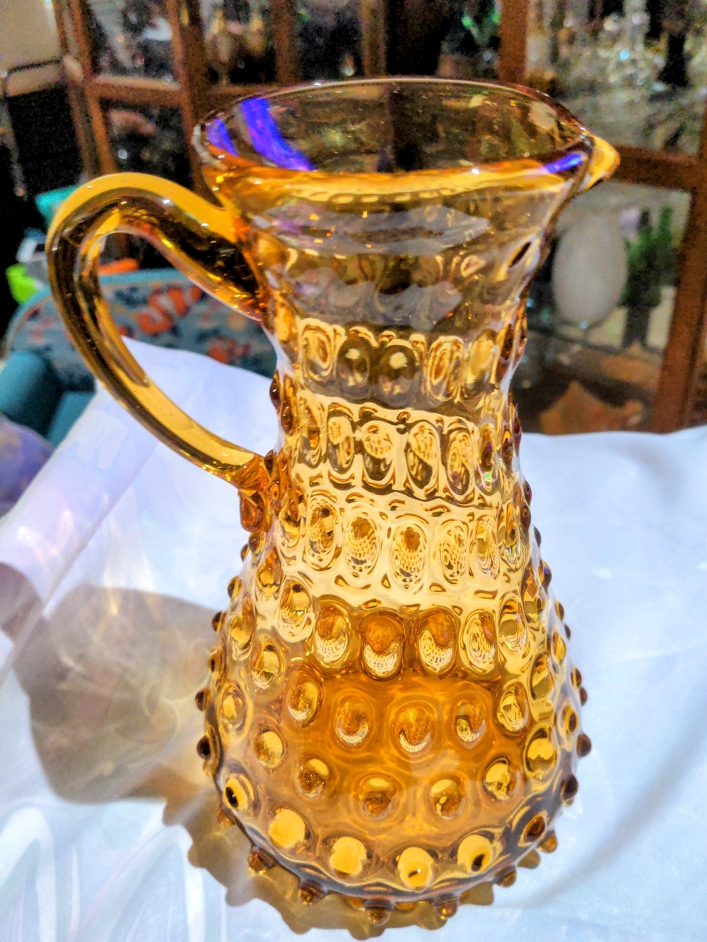 Vintage Empoli hand-blown amber hobnail glass pitcher with applied handle. 8.5"